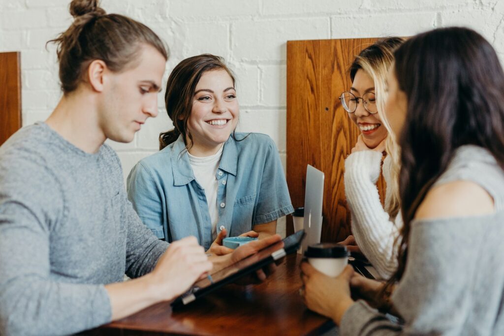 A group of friends at a coffee shop - How Does ADHD Affect Relationships